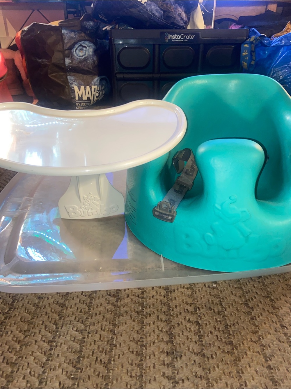 Bumbo Floor Seat paired with a detachable white Bumbo Seat Tray Attachment.